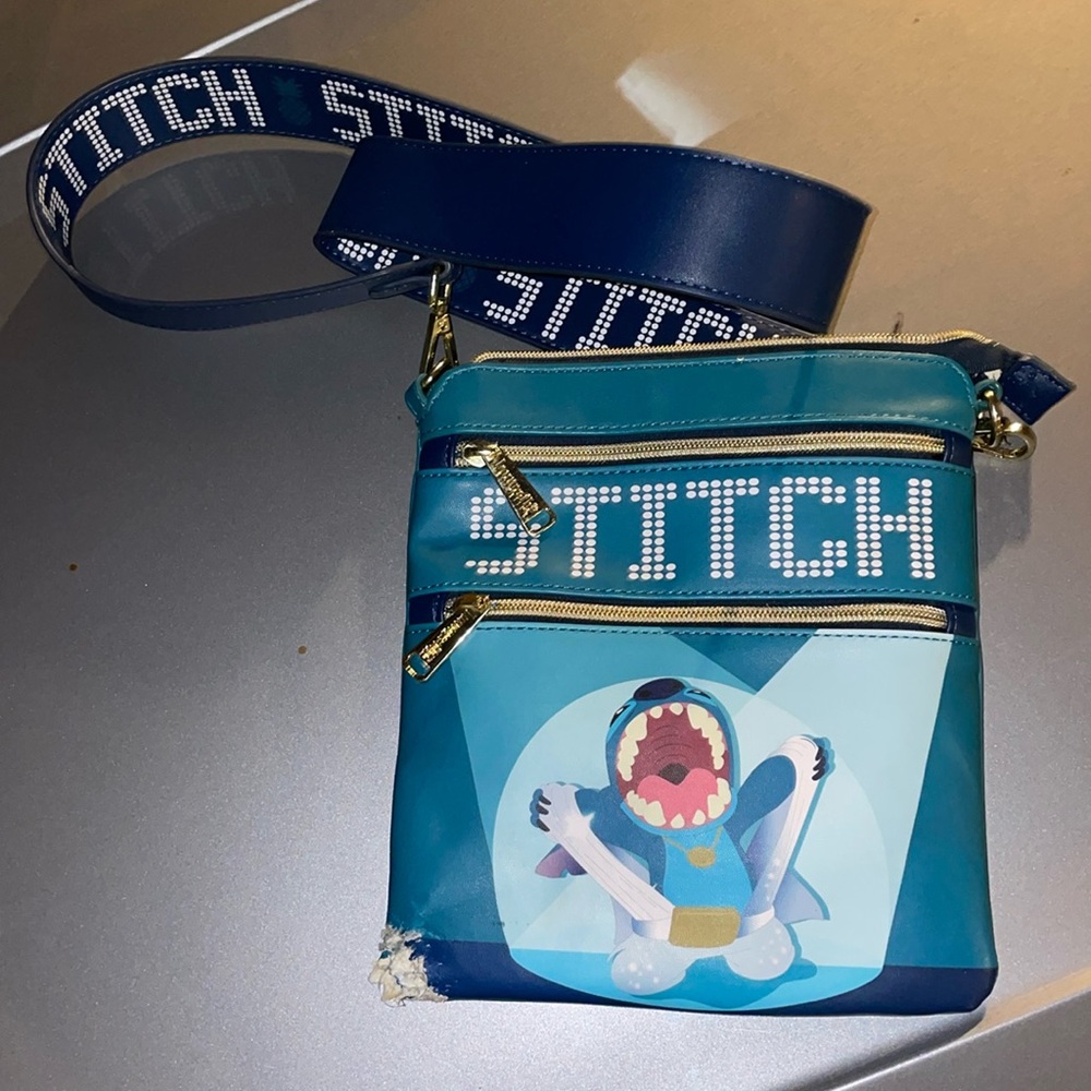Loungefly rare LILO & stitch Elviscrossbody NwOT damage at left corner blue teal